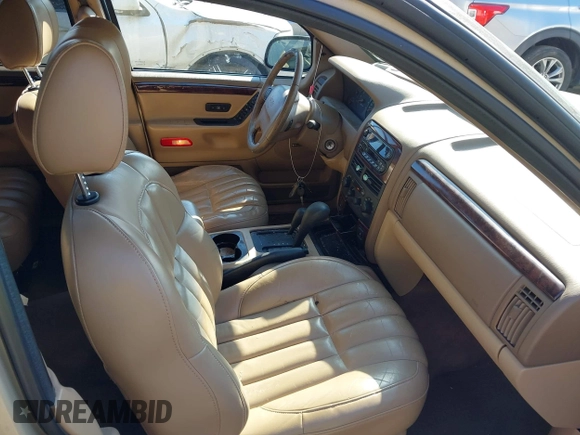 ✅ 2000 Jeep Grand Cherokee Limited • VIN: 1J4GW58N9YC277664 • Lot: 44351482. Wystawiony na IAAI z przebiegiem 140 529 mil. Bezpłatny archiwum sprzedaży aukcyjnych z USA i szczegółowy raport historii pojazdu na DreamBid. Zdjęcie 5.