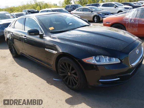 ✅ 2013 Jaguar XJ • VIN: SAJWJ1CD0D8V45278 • Lot: 45083568. Listed on IAAI with 151,659 mi. Free auction sales archive from the USA and detailed vehicle history report at DreamBid. Image 1.