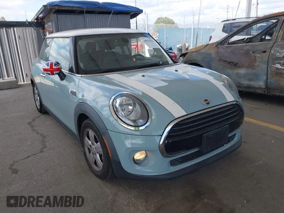 ✅ 2018 MINI Hardtop Cooper • VIN: WMWXP5C51J2G63923 • Лот: 44976364. Опубликован ранее на IAAI с пробегом 57 300 миль. Бесплатный доступ к архиву аукционных продаж из США и подробный отчёт об истории автомобиля на DreamBid. Изображение 1.
