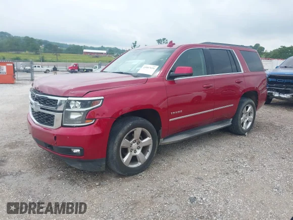 ✅ 2015 Chevrolet Tahoe LT • VIN: 1GNSKBKC4FR628192 • Lot: 45007656. Listed on IAAI with 151,497 mi. Free auction sales archive from the USA and detailed vehicle history report at DreamBid. Image 2.