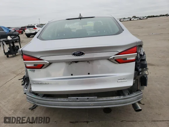 ✅ 2020 Ford Fusion SEL • VIN: 3FA6P0CD2LR193170 • Лот: 67631962. Опубликован ранее на Copart с пробегом 69 444 миль. Бесплатный доступ к архиву аукционных продаж из США и подробный отчёт об истории автомобиля на DreamBid. Изображение 6.