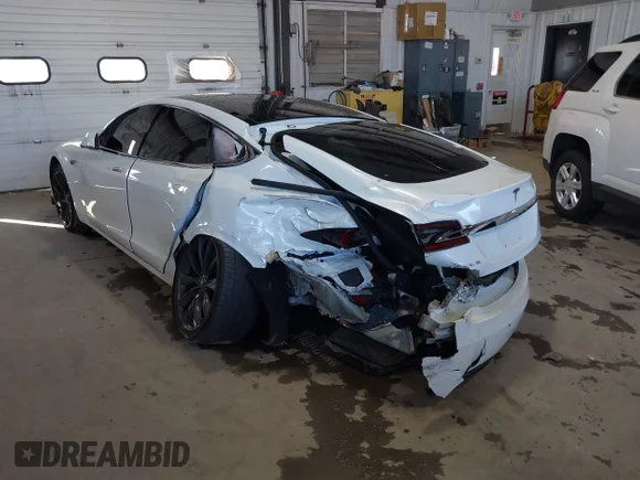 ✅ 2016 Tesla Model S 90D • VIN: 5YJSA1E2XGF158976 • Lot: 41200612. Listed on IAAI with 46,727 mi. Free auction sales archive from the USA and detailed vehicle history report at DreamBid. Image 3.