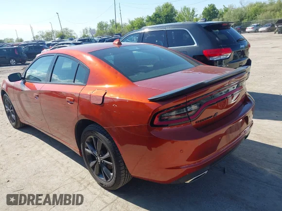 ✅ 2020 Dodge Charger SXT • VIN: 2C3CDXJG0LH205182 • Lot: 44950265. Listed on IAAI with 59,454 mi. Free auction sales archive from the USA and detailed vehicle history report at DreamBid. Image 3.