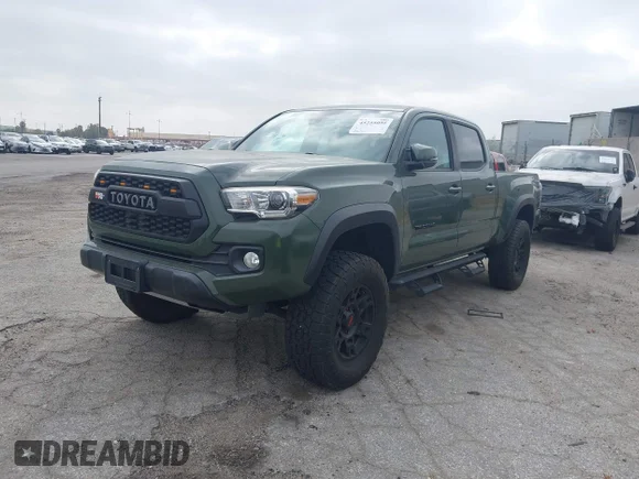 ✅ 2021 Toyota Tacoma TRD Off Road • VIN: 3TMDZ5BN6MM113435 • Lot: 45255095. Wystawiony na IAAI z przebiegiem 19 697 mil. Bezpłatny archiwum sprzedaży aukcyjnych z USA i szczegółowy raport historii pojazdu na DreamBid. Zdjęcie 2.