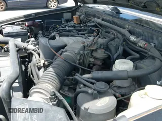 ✅ 1990 Nissan Pathfinder LE • VIN: JN8HD17Y7LW218807 • Lot: 42164713. Listed on IAAI with 154,842 mi. Free auction sales archive from the USA and detailed vehicle history report at DreamBid. Image 12.