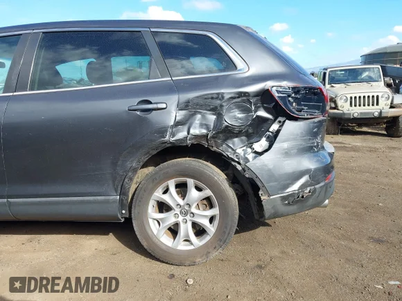 ✅ 2015 Mazda CX-9 Touring • VIN: JM3TB2CA7F0469626 • Lot: 41142297. Wystawiony na IAAI z przebiegiem 68 704 mil. Bezpłatny archiwum sprzedaży aukcyjnych z USA i szczegółowy raport historii pojazdu na DreamBid. Zdjęcie 6.