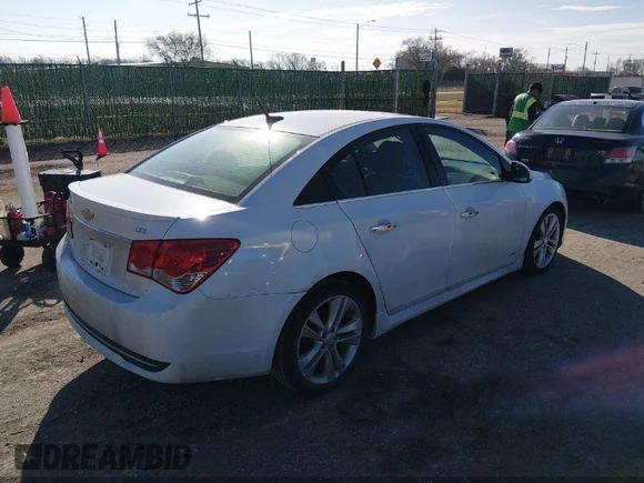 ✅ 2014 Chevrolet Cruze LTZ • VIN: 1G1PG5SBXE7196543 • Lot: 44645556. Wystawiony na IAAI z przebiegiem 131 009 mil. Bezpłatny archiwum sprzedaży aukcyjnych z USA i szczegółowy raport historii pojazdu na DreamBid. Zdjęcie 4.