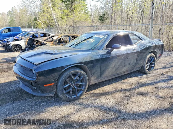✅ 2022 Dodge Challenger SXT • VIN: 2C3CDZAG2NH113568 • Лот: 48290736. Опубликован ранее на Copart с пробегом 57 045 миль. Бесплатный доступ к архиву аукционных продаж из США и подробный отчёт об истории автомобиля на DreamBid. Изображение 1.