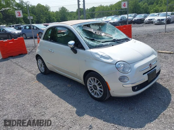 ✅ 2013 FIAT 500 Lounge • VIN: 3C3CFFER0DT648893 • Lot: 42399548. Wystawiony na IAAI z przebiegiem 74 692 mil. Bezpłatny archiwum sprzedaży aukcyjnych z USA i szczegółowy raport historii pojazdu na DreamBid. Zdjęcie 1.