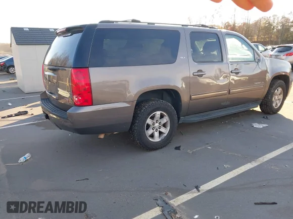 ✅ 2014 GMC Yukon XL SLT • VIN: 1GKS1KE06ER127515 • Lot: 40990479. Listed on IAAI with 236,725 mi. Free auction sales archive from the USA and detailed vehicle history report at DreamBid. Image 4.