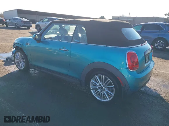 ✅ 2016 MINI Convertible • VIN: WMWWG5C50G3C19656 • Lot: 41429611. Wystawiony na IAAI z przebiegiem 60 873 mil. Bezpłatny archiwum sprzedaży aukcyjnych z USA i szczegółowy raport historii pojazdu na DreamBid. Zdjęcie 3.