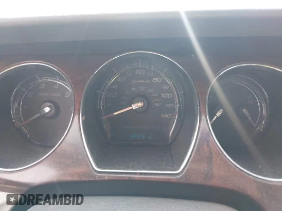 ✅ 2010 Ford Taurus SEL • VIN: 1FAHP2EW1AG128933 • Lot: 45015516. Listed on IAAI with 187,018 mi. Free auction sales archive from the USA and detailed vehicle history report at DreamBid. Image 7.