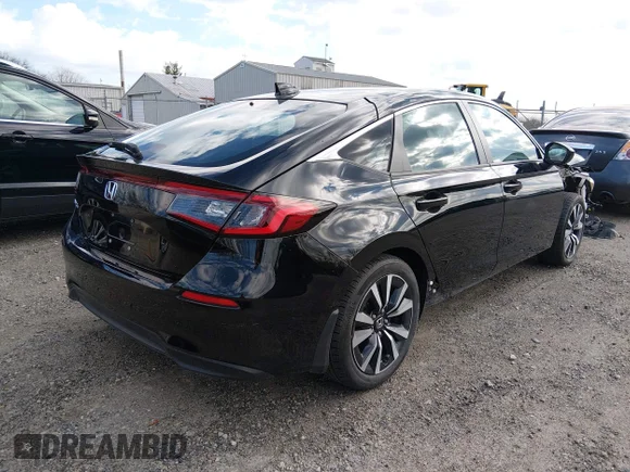✅ 2023 Honda Civic EX-L • VIN: 19XFL1H73PE002982 • Lot: 44803475. Wystawiony na IAAI z przebiegiem 1 459 mil. Bezpłatny archiwum sprzedaży aukcyjnych z USA i szczegółowy raport historii pojazdu na DreamBid. Zdjęcie 4.