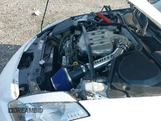 ✅ 2006 Nissan 350Z Touring • VIN: JN1AZ34D06M310839 • Лот: 42625453. Опубликован ранее на IAAI с пробегом 171 264 миль. Бесплатный доступ к архиву аукционных продаж из США и подробный отчёт об истории автомобиля на DreamBid. Изображение 14.