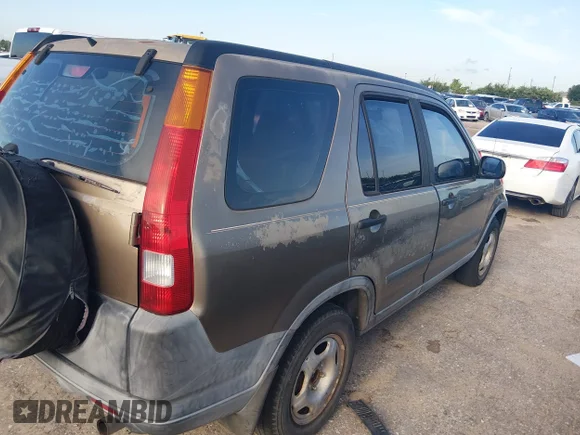✅ 2004 Honda CR-V LX • VIN: SHSRD68484U208732 • Lot: 45551992. Listed on IAAI with 214,714 mi. Free auction sales archive from the USA and detailed vehicle history report at DreamBid. Image 4.