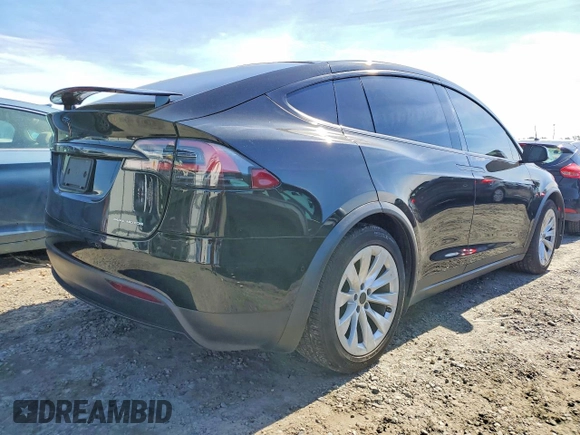✅ 2020 Tesla Model X Long Range • VIN: 5YJXCBE27LF233682 • Lot: 78264155. Listed on Copart with 88,681 mi. Free auction sales archive from the USA and detailed vehicle history report at DreamBid. Image 3.