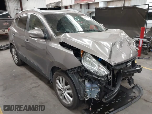 ✅ 2013 Hyundai Tucson Limited • VIN: KM8JU3AC0DU587572 • Lot: 44368158. Listed on IAAI with 128,214 mi. Free auction sales archive from the USA and detailed vehicle history report at DreamBid. Image 1.