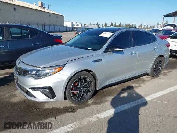 ✅ 2019 Kia Optima SX • VIN: 5XXGW4L2XKG376756 • Lot: 44857603. Listed on IAAI with 79,867 mi. Free auction sales archive from the USA and detailed vehicle history report at DreamBid. Image 2.