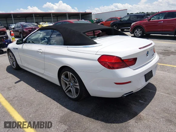✅ 2012 BMW 6 Series 650i • VIN: WBALZ3C5XCDL71463 • Lot: 45399640. Listed on IAAI with 111,406 mi. Free auction sales archive from the USA and detailed vehicle history report at DreamBid. Image 3.
