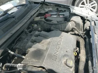 ✅ 2012 Lincoln MKS • VIN: 1LNHL9DR2CG800331 • Lot: 42119386. Listed on IAAI with 222,421 mi. Free auction sales archive from the USA and detailed vehicle history report at DreamBid. Image 12.