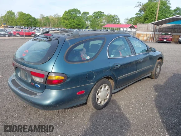 ✅ 1997 Ford Taurus GL • VIN: 1FALP57U4VA147895 • Lot: 44825538. Wystawiony na IAAI z przebiegiem Nie podano. Bezpłatny archiwum sprzedaży aukcyjnych z USA i szczegółowy raport historii pojazdu na DreamBid. Zdjęcie 4.
