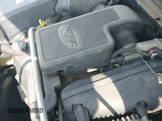 ✅ 2005 GMC Envoy SLE • VIN: 1GKES12S056166290 • Лот: 42662410. Опубликован ранее на IAAI с пробегом 65 516 миль. Бесплатный доступ к архиву аукционных продаж из США и подробный отчёт об истории автомобиля на DreamBid. Изображение 13.