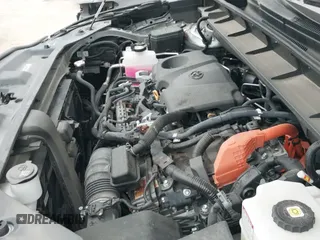 ✅ 2024 Toyota Highlander Hybrid XLE • VIN: 5TDKBRCH1RS607561 • Lot: 41483906. Wystawiony na IAAI z przebiegiem 26 158 mil. Bezpłatny archiwum sprzedaży aukcyjnych z USA i szczegółowy raport historii pojazdu na DreamBid. Zdjęcie 20.