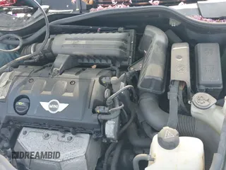 ✅ 2014 MINI Convertible • VIN: WMWZN3C51ET569556 • Lot: 42176151. Wystawiony na IAAI z przebiegiem 158 846 mil. Bezpłatny archiwum sprzedaży aukcyjnych z USA i szczegółowy raport historii pojazdu na DreamBid. Zdjęcie 19.