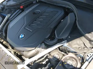 ✅ 2022 BMW 8 Series 840i • VIN: WBAGV2C09NCH74342 • Лот: 42326824. Опубликован ранее на IAAI с пробегом 12 745 миль. Бесплатный доступ к архиву аукционных продаж из США и подробный отчёт об истории автомобиля на DreamBid. Изображение 21.