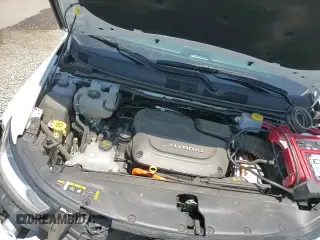 ✅ 2023 Chrysler Pacifica Hybrid Touring L • VIN: 2C4RC1L74PR614577 • Лот: 67807125. Опубликован ранее на Copart с пробегом 27 179 миль. Бесплатный доступ к архиву аукционных продаж из США и подробный отчёт об истории автомобиля на DreamBid. Изображение 14.