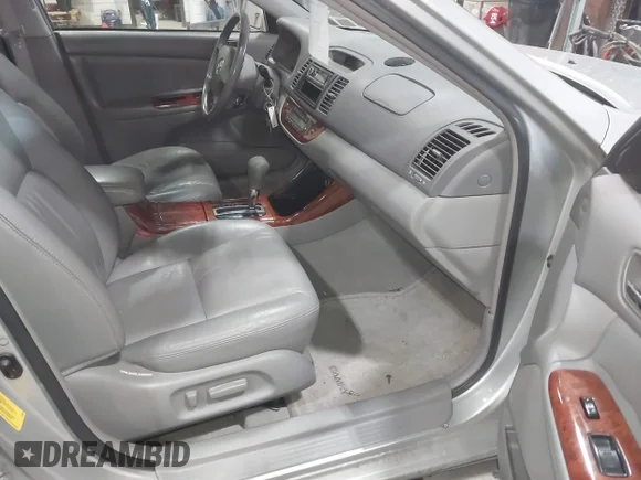 ✅ 2003 Toyota Camry LE • VIN: 4T1BF30K73U552310 • Lot: 44352731. Wystawiony na IAAI z przebiegiem 153 260 mil. Bezpłatny archiwum sprzedaży aukcyjnych z USA i szczegółowy raport historii pojazdu na DreamBid. Zdjęcie 5.