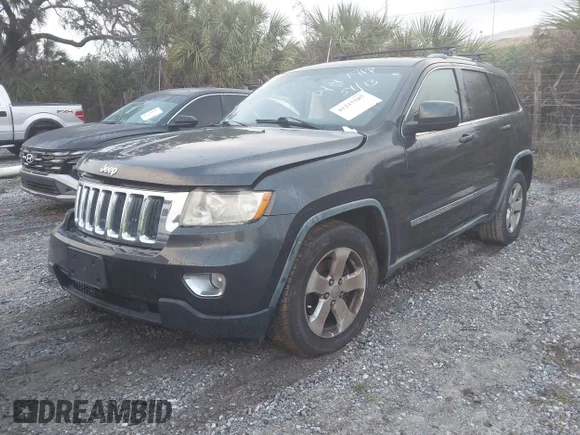 ✅ 2011 Jeep Grand Cherokee Laredo • VIN: 1J4RR4GG2BC737140 • Lot: 41217587. Listed on IAAI with Not provided. Free auction sales archive from the USA and detailed vehicle history report at DreamBid. Image 2.