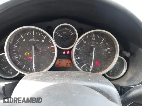 ✅ 2008 Mazda MX-5 Miata Grand Touring • VIN: JM1NC26F380142908 • Lot: 44268457. Wystawiony na IAAI z przebiegiem 186 065 mil. Bezpłatny archiwum sprzedaży aukcyjnych z USA i szczegółowy raport historii pojazdu na DreamBid. Zdjęcie 7.