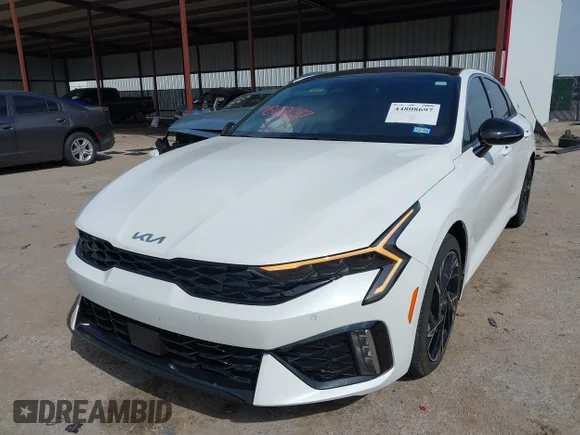 ✅ 2025 Kia K5 GT-Line • VIN: KNAG64J78S5309945 • Lot: 44808697. Wystawiony na IAAI z przebiegiem 22 695 mil. Bezpłatny archiwum sprzedaży aukcyjnych z USA i szczegółowy raport historii pojazdu na DreamBid. Zdjęcie 2.