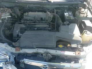 ✅ 2000 Mazda Protege DX • VIN: JM1BJ2228Y0211488 • Lot: 42767029. Wystawiony na IAAI z przebiegiem 122 564 mil. Bezpłatny archiwum sprzedaży aukcyjnych z USA i szczegółowy raport historii pojazdu na DreamBid. Zdjęcie 18.