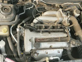 ✅ 1997 Mazda Protege DX • VIN: JM1BC1418V0165780 • Lot: 42735711. Wystawiony na IAAI z przebiegiem 65 652 mil. Bezpłatny archiwum sprzedaży aukcyjnych z USA i szczegółowy raport historii pojazdu na DreamBid. Zdjęcie 12.