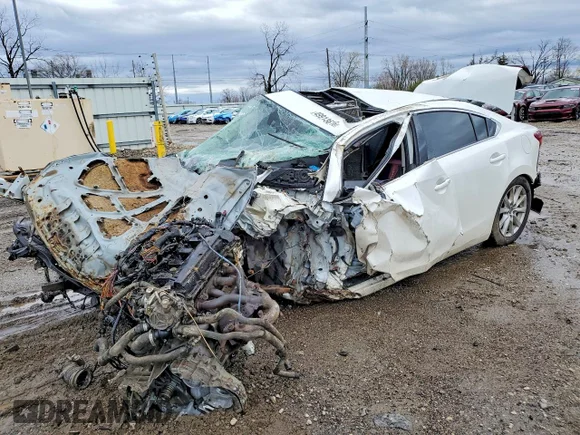✅ 2014 Mazda 6 i Touring • VIN: JM1GJ1V61E1119322 • Лот: 49913616. Опубликован ранее на Copart с пробегом Не указан. Бесплатный доступ к архиву аукционных продаж из США и подробный отчёт об истории автомобиля на DreamBid. Изображение 1.