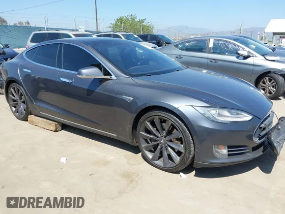 ✅ 2014 Tesla Model S 60 • VIN: 5YJSA1H15EFP65285 • Lot: 42297394. Listed on IAAI with 178,866 mi. Free auction sales archive from the USA and detailed vehicle history report at DreamBid. Image 1.