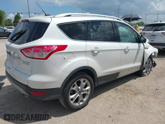 ✅ 2014 Ford Escape Titanium • VIN: 1FMCU0J91EUD56077 • Lot: 45305202. Wystawiony na IAAI z przebiegiem 74 556 mil. Bezpłatny archiwum sprzedaży aukcyjnych z USA i szczegółowy raport historii pojazdu na DreamBid. Zdjęcie 4.