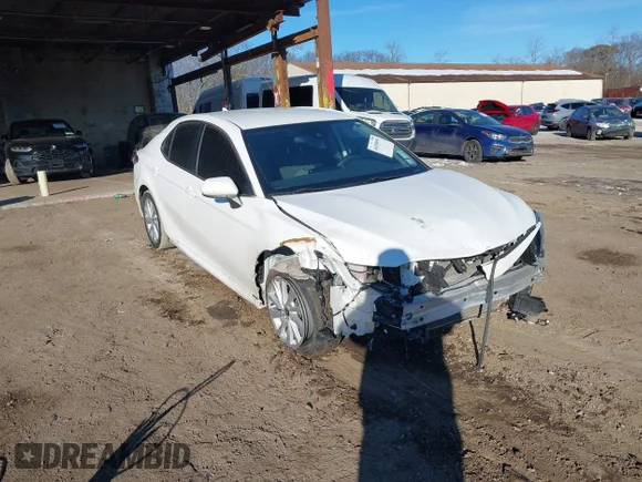 ✅ 2022 Toyota Camry LE • VIN: 4T1C11BK8NU051420 • Lot: 44350055. Listed on IAAI with 57,298 mi. Free auction sales archive from the USA and detailed vehicle history report at DreamBid. Image 1.