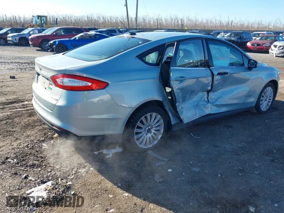 ✅ 2014 Ford Fusion S Hybrid • VIN: 3FA6P0UU8ER181803 • Лот: 43997050. Опубліковано раніше на IAAI з пробігом 143 499 миль. Безкоштовний доступ до архіву аукціонних продажів зі США та докладний звіт про історію автомобіля на DreamBid. Зображення 4.