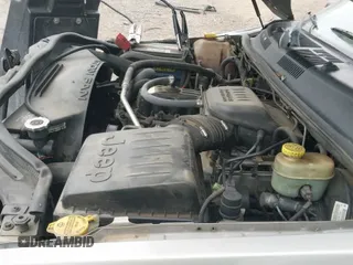 ✅ 2002 Jeep Grand Cherokee • VIN: 1J8GX48S42C147018 • Lot: 43589496. Listed on IAAI with 192,014 mi. Free auction sales archive from the USA and detailed vehicle history report at DreamBid. Image 16.