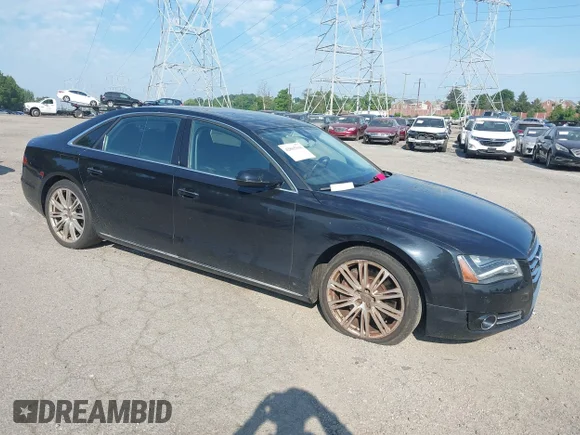 ✅ 2011 Audi A8 • VIN: WAURVAFD4BN020568 • Lot: 42865116. Listed on IAAI with 119,793 mi. Free auction sales archive from the USA and detailed vehicle history report at DreamBid. Image 1.
