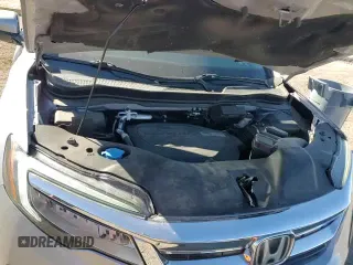 ✅ 2020 Honda Pilot Touring 7-Passenger • VIN: 5FNYF6H67LB016599 • Лот: 91393525. Опубликован ранее на Copart с пробегом 80 281 миль. Бесплатный доступ к архиву аукционных продаж из США и подробный отчёт об истории автомобиля на DreamBid. Изображение 13.