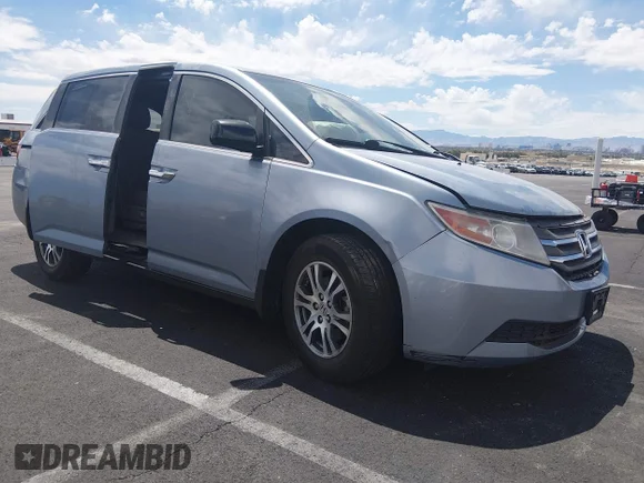 ✅ 2012 Honda Odyssey EX-L • VIN: 5FNRL5H6XCB075511 • Lot: 44956862. Listed on IAAI with 171,491 mi. Free auction sales archive from the USA and detailed vehicle history report at DreamBid. Image 1.