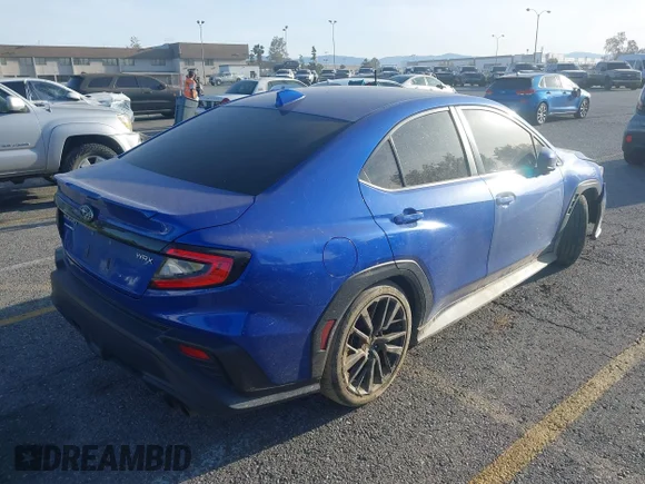 ✅ 2022 Subaru WRX Premium • VIN: JF1VBAF68N9004842 • Лот: 44616657. Опубліковано раніше на IAAI з пробігом 99 387 миль. Безкоштовний доступ до архіву аукціонних продажів зі США та докладний звіт про історію автомобіля на DreamBid. Зображення 4.