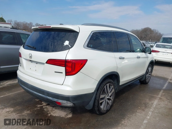 ✅ 2017 Honda Pilot Touring • VIN: 5FNYF5H93HB037901 • Lot: 44349165. Wystawiony na IAAI z przebiegiem 113 283 mil. Bezpłatny archiwum sprzedaży aukcyjnych z USA i szczegółowy raport historii pojazdu na DreamBid. Zdjęcie 4.