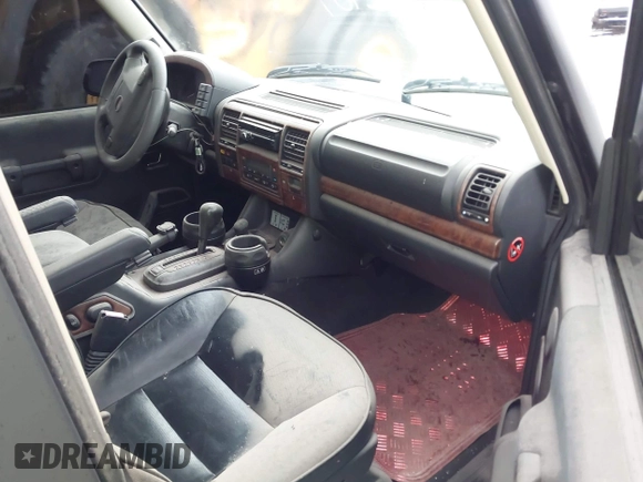 ✅ 2004 Land Rover Discovery SE • VIN: SALTY19404A853251 • Лот: 43536291. Опубліковано раніше на IAAI з пробігом 169 143 миль. Безкоштовний доступ до архіву аукціонних продажів зі США та докладний звіт про історію автомобіля на DreamBid. Зображення 5.