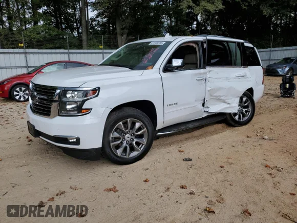 ✅ 2020 Chevrolet Tahoe Premier • VIN: 1GNSCCKC6LR221506 • Lot: 81949285. Listed on Copart with 96,889 mi. Free auction sales archive from the USA and detailed vehicle history report at DreamBid. Image 1.