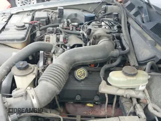 ✅ 2000 Ford Crown Victoria Police Interceptor • VIN: 2FAFP71W0YX183498 • Lot: 42388246. Wystawiony na IAAI z przebiegiem 250 591 mil. Bezpłatny archiwum sprzedaży aukcyjnych z USA i szczegółowy raport historii pojazdu na DreamBid. Zdjęcie 22.